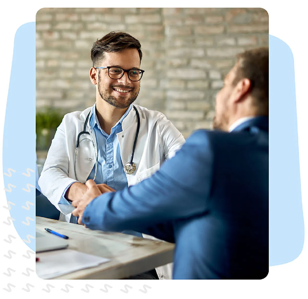 Doctor shaking hands with a patient