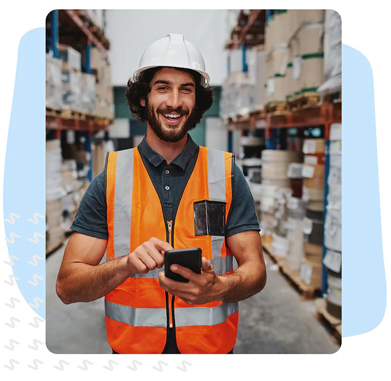 Improve Absence Management man in warehouse with a hardhat