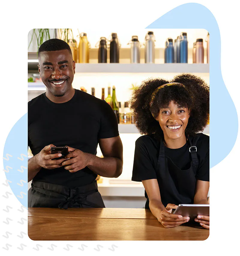 two employees working at a restaurant