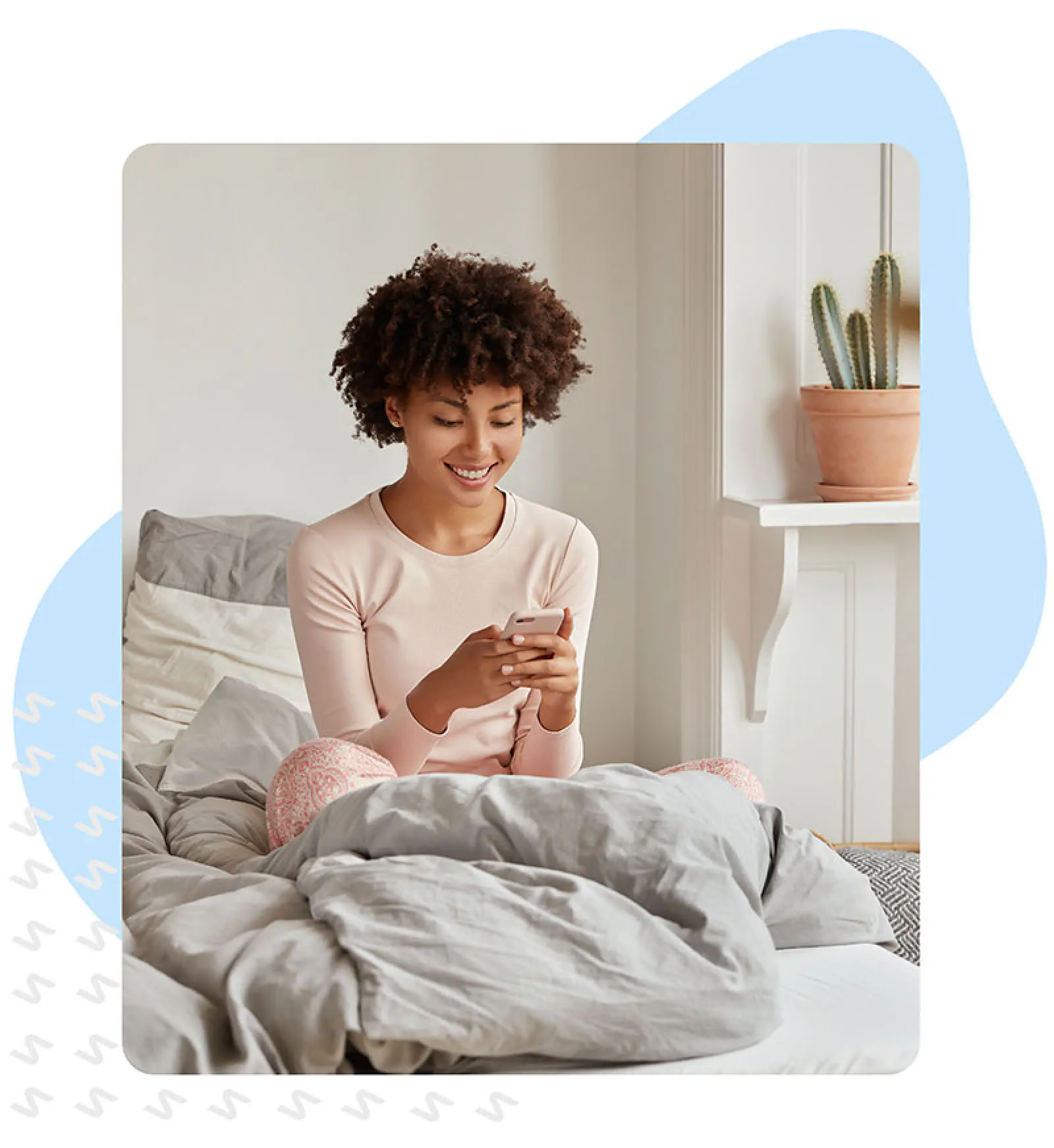 Woman texting while sick from her bed